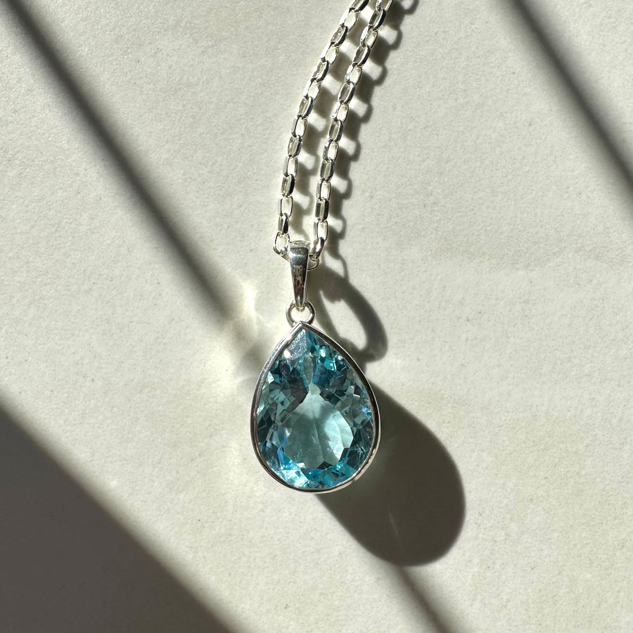 Sterling Silver Blue Topaz Fancy Cut Rubover Pendant