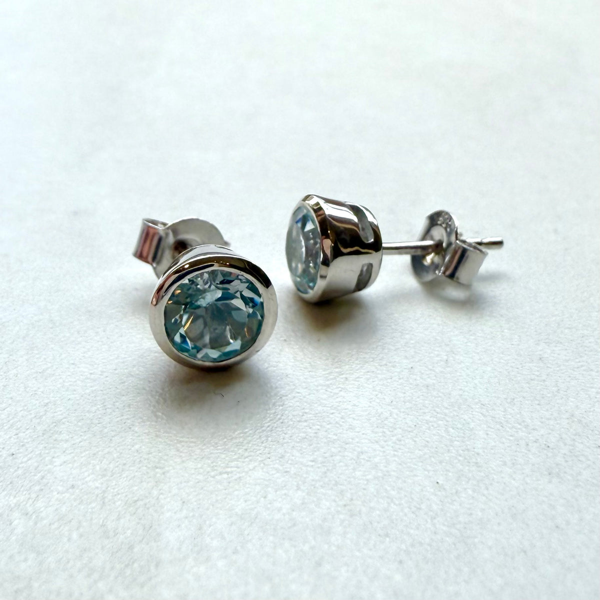 Sterling Silver Light Blue Topaz Stud Earrings