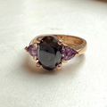 9ct Red Gold Oval Black Diamond & Trillon Cut Pink Sapphire Ring