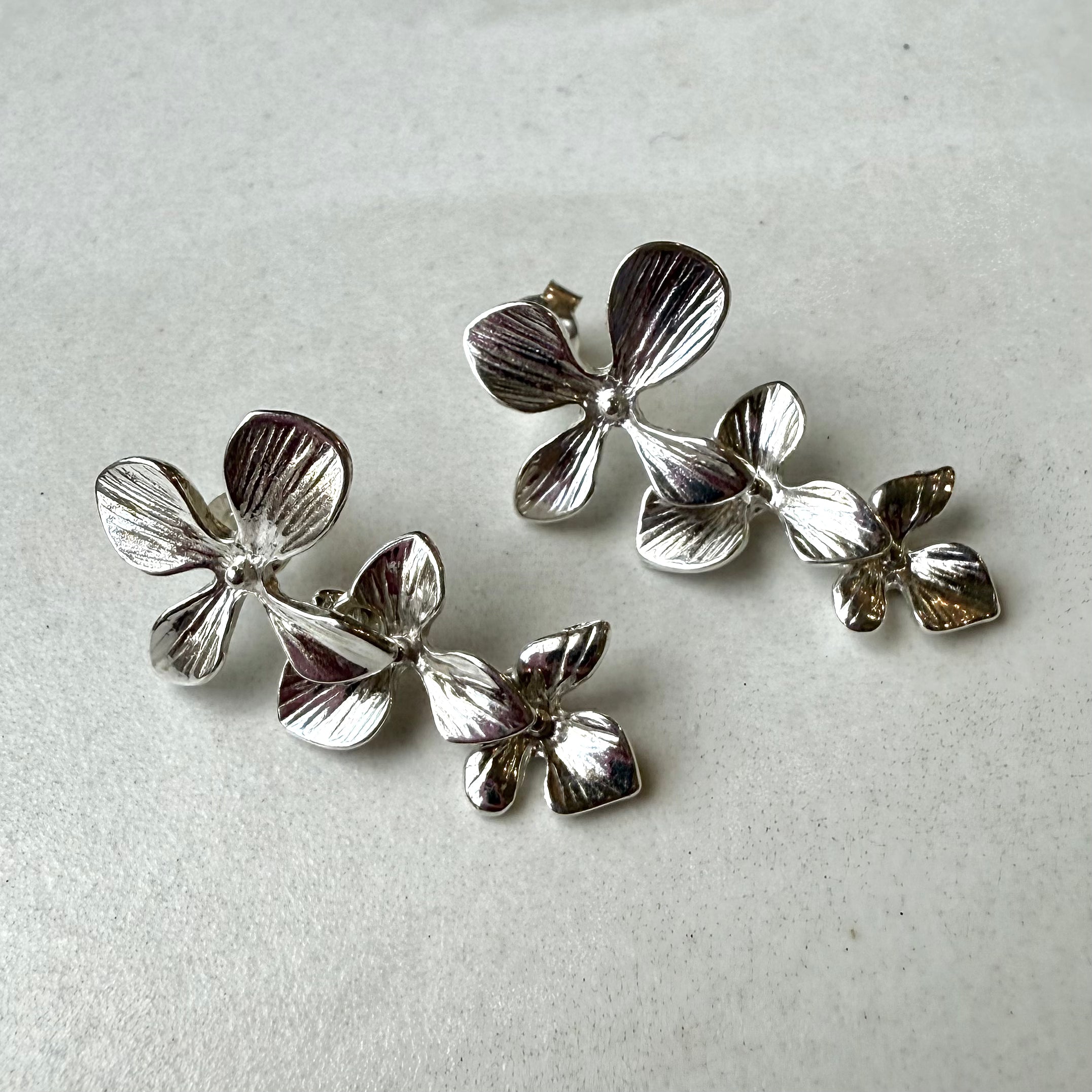 Sterling Silver Textured Triple Flower Stud Drop Earrings