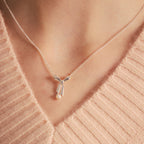 KAREN WALKER - STERLING SILVER BOW WITH PEARL NECKLACE