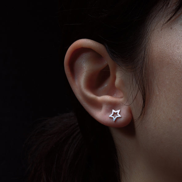 KAREN WALKER - STERLING SILVER MINI STAR STUDS