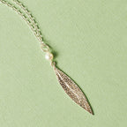 KAREN WALKER - STERLING SILVER & CULTURED PEARL LEAF PENDANT