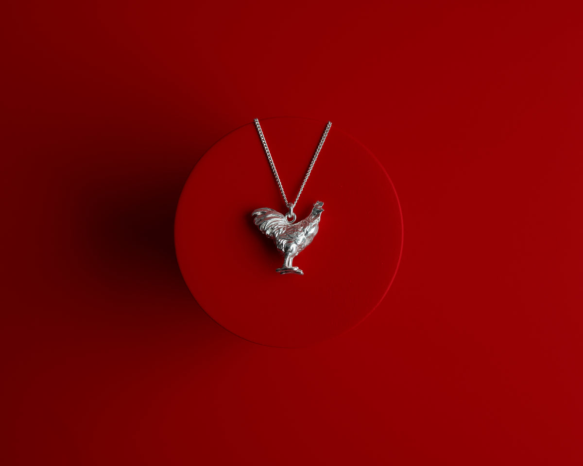 KAREN WALKER - STERLING SILVER LUNAR ROOSTER NECKLACE