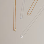 KAREN WALKER - STERLING SILVER MINI STAR NECKLACE